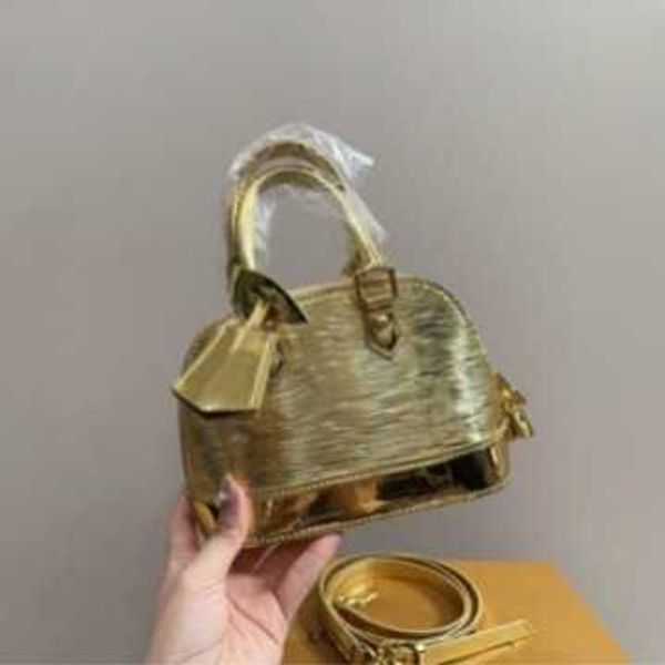 Bolso bolso de alta definición concha de ondulación con superficie de cuero de pintura brillante mini para mujeres