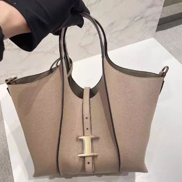 Sac fourre-tout pour femmes, nouveau sac haut de gamme avec bouton en T, grande capacité, épaule dénudée, portable, à la mode, pour mère et enfant