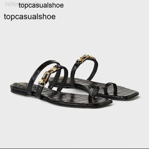 Toteme chaussures sandales pantoufle française Été Nouvelle mode décontractée minimaliste minimaliste authentique en cuir pantoufle crocodile motif plat plie de fond d'orteil pour femmes 3jhf