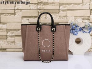 Totes 2023 Nuevo bolso de mano Moda para mujer diseñador de marca de lujo Bolso de mano Lona informal blanco Un hombro Portátil de cuero femenino Hombro de compras 010623H