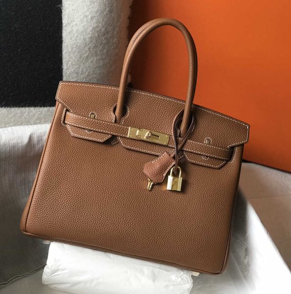 Totes 7A Bolsa de calidad superior Mujeres Diseñador de carteras Bolsas de asas Bolso de lujo hecho a mano Moda clásica Togo Cartera de cuero Sac De Luxe Femme