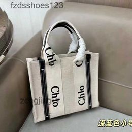 Bakkenzakken Hands 2024 Outlet Cloe canvas Tote Woody Bag Zomer Leisure Japanese ontwerper Gedrukte brief Winkelen Grote capaciteit Fashio FKNR