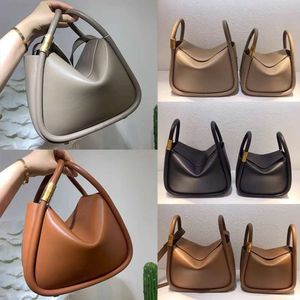 Totes Cross Body Wonton Buns Couche de tête Veau Tenu à la main incliné sur une épaule en cuir véritable Sac pour femmeUne niche