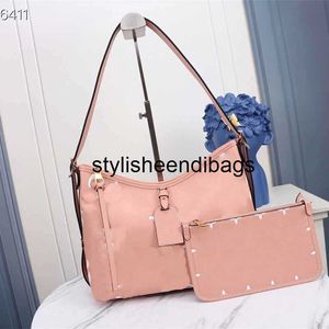 Totes Sac à main de créateur Fourre-tout de luxe pour femme Sac à bandoulière Ensemble 2 pièces en cuir Sac à provisions imprimé grand volume Accessoiriser avec une mini fermeture à glissière en relief Pochette