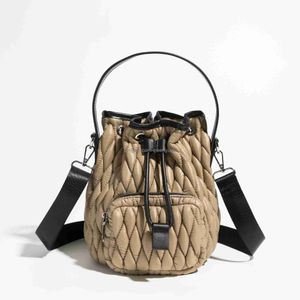 Bakken mode nylon gewatteerde emmers tas ontwerper gewatteerde dames handtassen luxe naar beneden katoenen schouder crossbody tassen casual kleine portemonnees 021323H