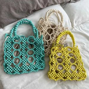 Totes Mode Perles En Bois Femmes Sacs À Main Designer Creux Petit Fourre-Tout De Luxe Dame D'été Sac De Plage Bali Shopper Sacs À Main 2022H24217