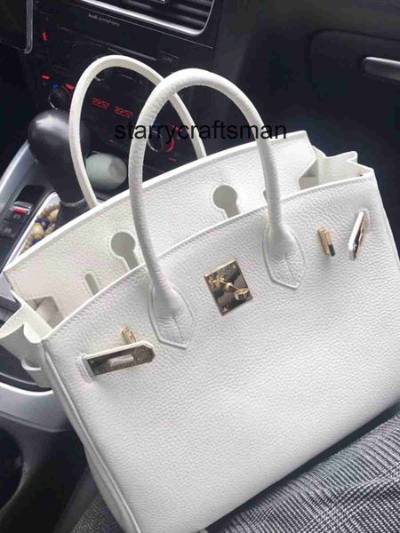 Totes Sac à main en cuir véritable L Couche de tête pour femme Sac à motif en peau de vache en cuir véritable À la mode Blanc pur Sac pour femme Sac à main pour femme Une épaule