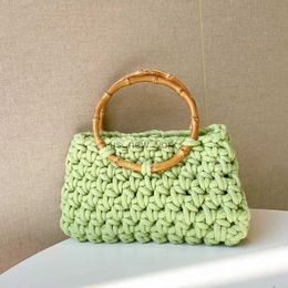 Tapés Hohemian Crochet Bamboo Handle Femme sacs à main Hollow Knitting Tote Sacs tissés pour femmes Square Claking Purse et Handbag Designer 240407
