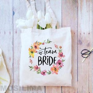 Totes équipe mariée impression mode sacs à bandoulière toile fourre-tout Shopping voyage réutilisable Bachelorette mariage fête nuptiale mendier