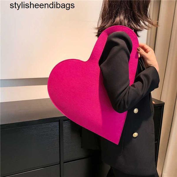 Tapés Ultralight Fashion Heart Handsbag Femmes Fered Top-Handle Shopping Tote Sac à bandoulière 2023 Couleur de bonbons tendance Nouveau sac à main élégante