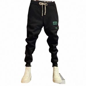 Pantalones de pista Hombres 2022 Pantalones deportivos de invierno Joggers Fleece Lana Pantalones holgados Bordado Carta Sweetpants Hombres Envío gratis Q2BM #