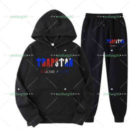 Спортивный костюм Trapstar Брендовая спортивная одежда с принтом Мужские футболки 16 цветов Теплый комплект из двух предметов Свободная толстовка с капюшоном Брюки для бега 220615 KASJGD