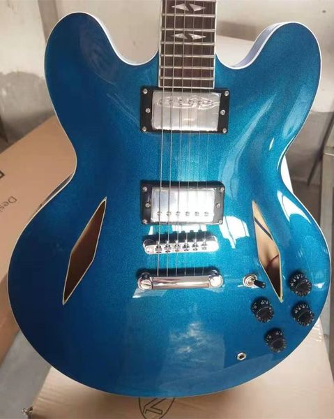 Guitare électrique translucide... instrument semi-creux bleu pour le jazz