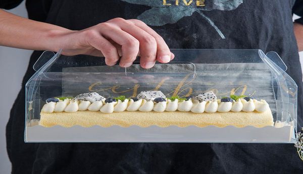 Boîte d'emballage de rouleau à gâteau transparent avec poignée Boîte à gâteau de fromage en plastique transparent écologique Boîte à rouleau suisse ZZA18641087574