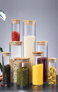 Transparante glazen voedselopslagbussen kurken bedekken pottenflessen voor zandvloeistof ecofvriendelijk met bamboe deksel geheel291L3587043