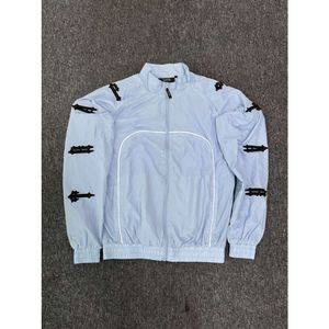 Trapstar Jacket Tracksuit Suit Irongate Shell Suit 2.0 Version Bleu et Black Quality Broidered Lettrage Femmes Coat IJ