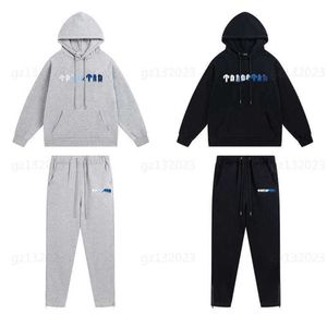 Trapstarr Costume Designer Hoodie Deux Pièces Ensemble Blanc Et Bleu Lettres Serviette Broderie Sweat Rembourré Et Pantalon Couple Survêtements Costume 0607