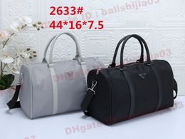 Bolsa de lona de viaje Classic Casual Tote Moda Bolsa de viaje Keepall Bandouliere Luxurys Designers Bolsos Mujeres / Hombres Diseñador Equipaje Gran capacidad Bolsas de equipaje E01