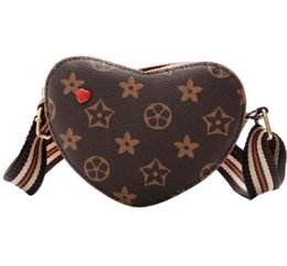 Travel Kids Sacs Girls Hands Hands Coin Purse Fashion Chéchante Fanny Pack Racs Crossbody Sac Designers Hands Sacs Pu Leather Mini Totes G9066841