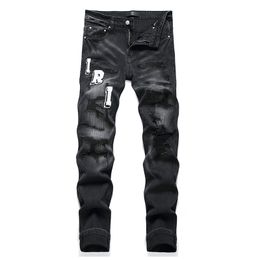 Jeans pour hommes déchirés noirs à la mode Badge brodé Pantalon slim extensible Slim Fit Trous Printemps Automne Punk Denim Coton Streetwear