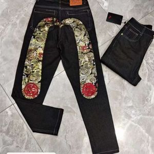 Brand de marque à tendance jeans fushen avec taille décontractée et personnalisée jacquard broderie épissant un tube droit pantalon imprimé 652445