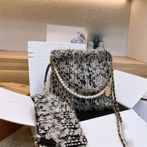 Trendy Riet Winter Pluche Schoudertassen Vrouwelijke Designer Tas Met Kralenketting Pluizige Nepbont Crossbody Tassen Voor Vrouwen Keten Luxe Handtassen En Portemonnees