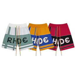 Trendy Rhude Letter Couleur bloquant Jacquard Tricoted Pull Shorts décontractés pour hommes et femmes, American High Street Capris