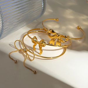 Bracelet à arc à arc à arc en or inoxydable TRENDY ACCESSOIRES DE CHANGE ouverte simples pour femmes Bijoux vintage des filles 240410