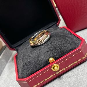 Trinity Ring Charms for Woman Designer Tamaño de pareja 678 Tricíclico Crossover T0P Calidad Gold de oro 18K Reproducción Oficial Aniversario de aniversario Con caja