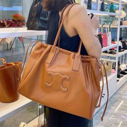 Designer Shopping Tote Bag Damesleer nieuwe hoge capaciteit pendelschouder Onderarmtas Opruiming Groothandel handtas met trekkoord aan de zijkant