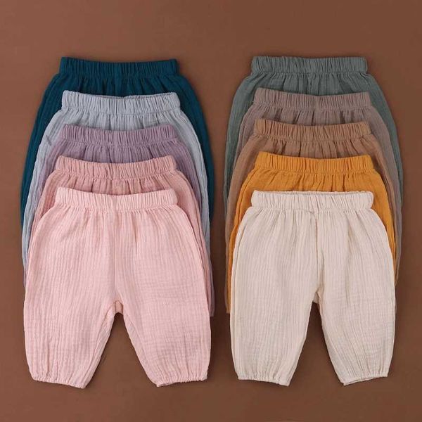 Pantalon bébé tissu coton plissé lumo couleur un pantalon harem bizarre décontracté pour les enfants doux et lâche D240517