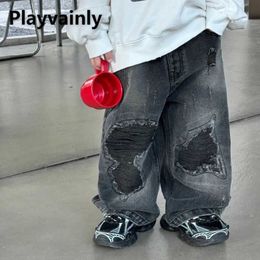 Pantalon de style coréen Nouveau bébé de printemps garçons déchirés jeans noir élastique taure pantalon large lâches de mode de mode H240507