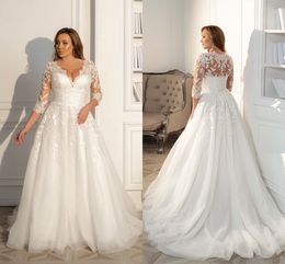 Tulle moderne plus taille une ligne robes de mariée sexy en V couche en lace un jardin boho robes de mariée avec des manches longues