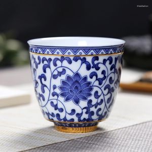 Tumblers blauwe en witte porseleinen theekop groot formaat in glazuur kleur geschilderd goud volle bloem retro stijl master single