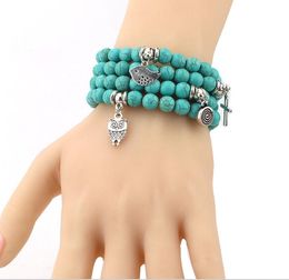 Bracelets de perles turquoise arbre hibou dauphin croix palmier bracelets à breloques