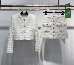 Designer de robes à deux pièces 23 automne / hiver nouveau baume Nanyou Fashion Fashion French French Fragrant Celebrity Coat Short Associé avec une jupe Set 6Z85