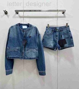 Tweedelige jurk ontwerper merk designer denim dames sport 2-delige set enkele rij knopen lange mouw o-hals jas driehoek shorts pak 2023 outfits casual