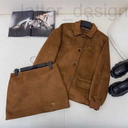 Robe deux pièces Designer de luxe 2024 début du printemps nouveau style Nanyou MIU veste à col ample + demi-jupe costume en fourrure de cerf artificiel NYFT