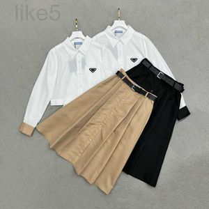 Designer de luxe Designer Lady Set Fashion Automne manches longues revers simple boutonnage Tops et jupes élégantes A-ligne H6KI