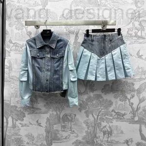 Designer de robes en deux pièces printemps et été nouvel Âge Nanyou PRA réduisant la veste patchwork de style sucré associée à une jupe en ligne de dim de dim.