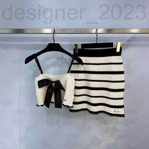 Tweedelige kledingontwerper Spring Summer Age Reduce Sweet Girl -stijl geborduurde boog korte mouwloze half rokset el1d