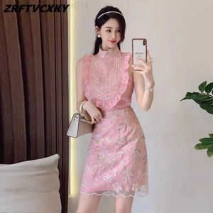 Tweede stuk jurk Elegant roze tweedelige set voor damesontwerper Paillin Stand Collar Zoet geplooide mouwloze shirt Top+Mini strakke passende pakc240407