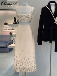 Robe de deux pièces Highend Luxury Hepburn Style White Twopiece Set 2023 Été sexy Sling High Taist Slim Midlengle Jirt élégant 230410