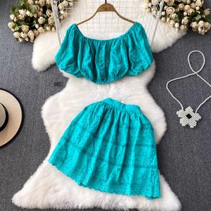 Robe en deux pièces Broderie de vacances d'été Femmes Femmes à manches bouffantes courtes Créquette crop top top élastique Mini jupes de coton de coton 2024