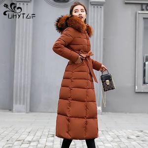 UHYTGF veste d'hiver femmes chaud Parkas mode nœud ceinture col en fourrure de renard Long manteau femmes surdimensionné Vintage épais manteau 1050 240112