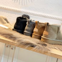 Ultra clásico botas mini mujeres plataforma de botas de nieve botón Matte piel de piel de piel de piel de piel mate mezcla de lana de lana de invierno tobillo de otoño 2023