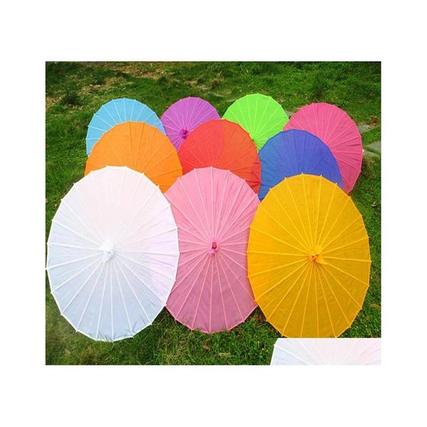 Parapluies 100pcs / lot petit grand parapluie chinois coloré Chine danse traditionnelle couleur parasol japonais accessoires de soie sn447 drop livraison dh2ir