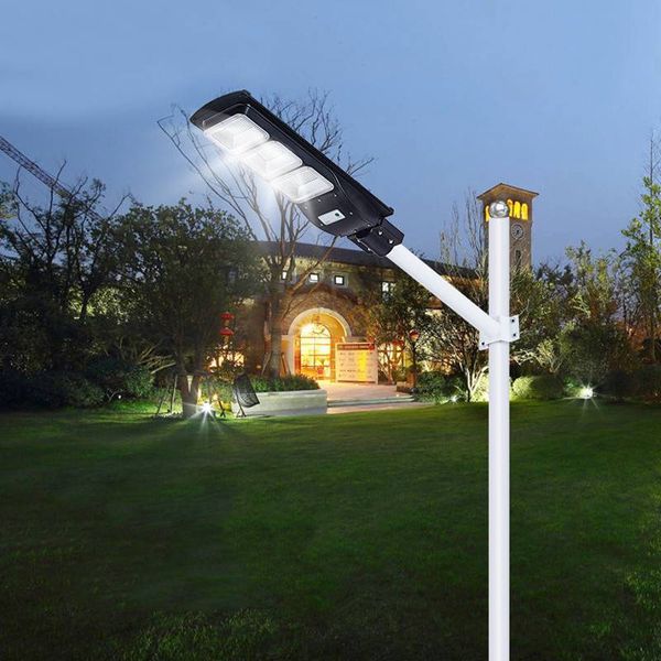 Umlight1688 60W 90W LED Solaire Éclairage Extérieur Radar PIR Capteur de Mouvement Mur Spot Lampe avec Pôle Télécommande Étanche pour Plaza Garden Yard