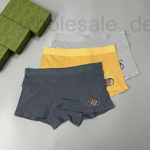 Sous-vêtements Designer 2023 Nouveaux sous-vêtements haut de gamme Boxers pour hommes sans couture coton de haute qualité confortable tête de tigre jeunesse pantalon bas à angle plat KCUO