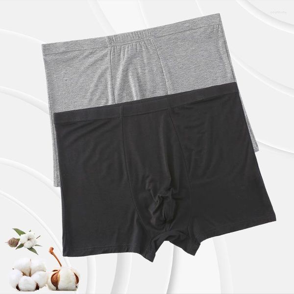 Calzoncillos bóxer sin costuras de algodón Modal para hombre, bragas diarias invisibles sólidas, ropa interior transpirable de talla grande, pantalones cortos con bolsa en U para mejorar el bulto